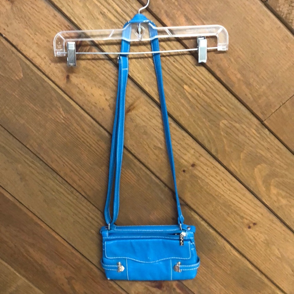 Aqua blue hip purse. Good condition